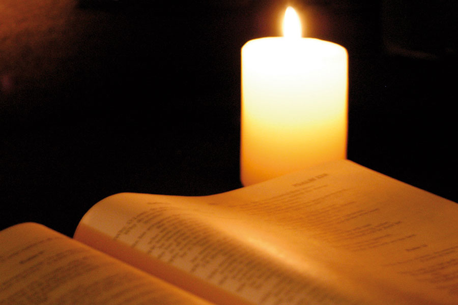 Bible and candle